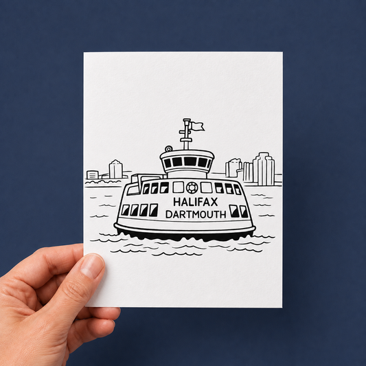 A hand holds a white art print featuring a black line drawing of a Halifax Dartmouth ferry against a dark navy blue background.